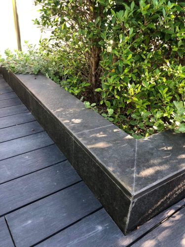 hsn-black-basalt-flamed-planter-coping-installed
