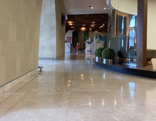 hsn-ecru-honed-interior-flooring-installed-wide-walkway